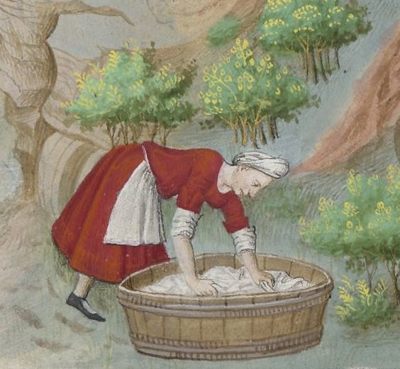 a Tudor laundress at work