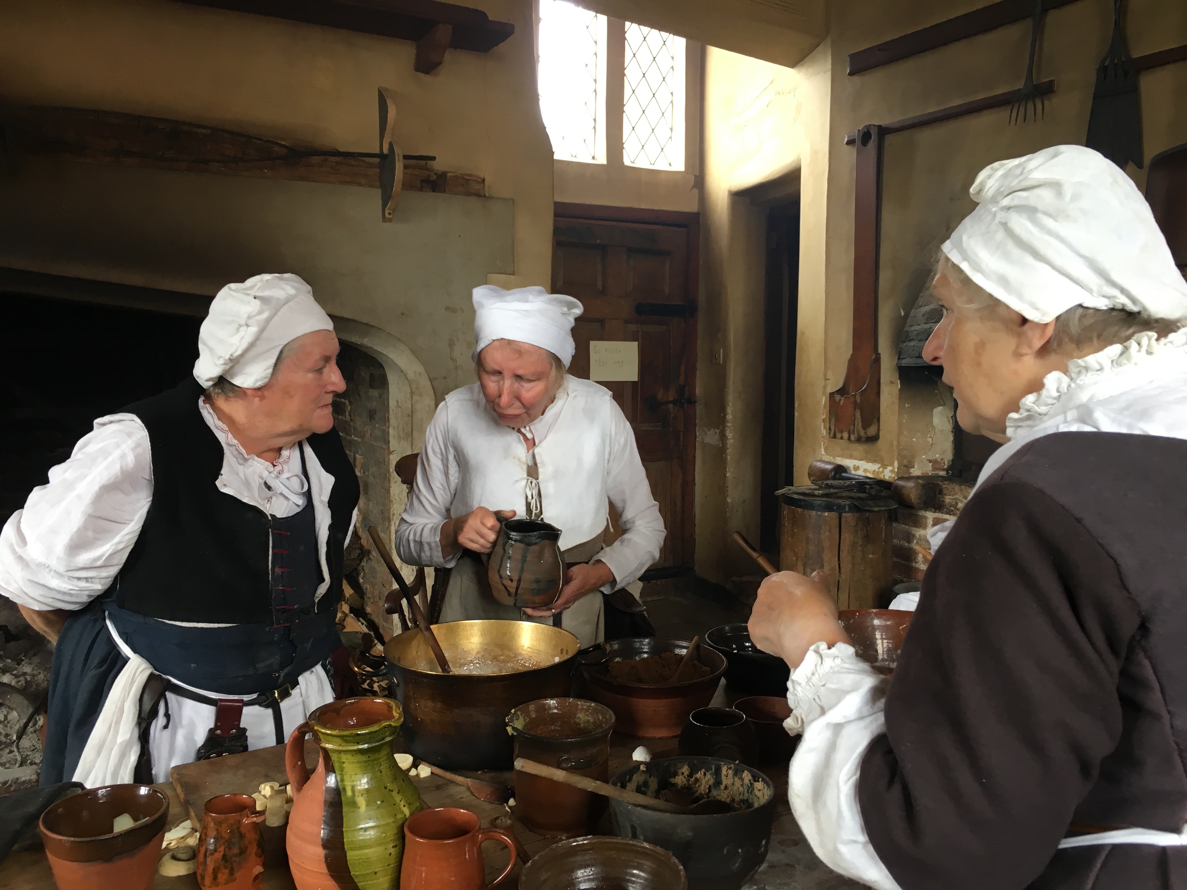 Cooks talking over the cooking at Tudor Kentwell