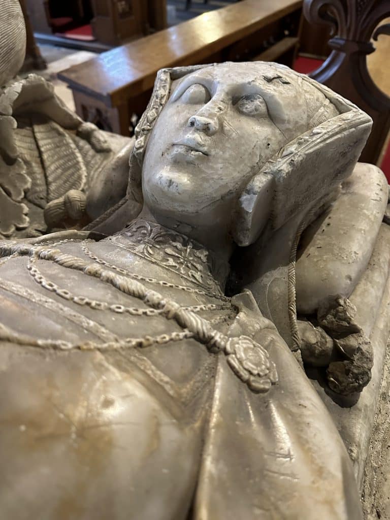 Gable hood, dress, jewellery and pendant detail on tomb effigy of Catherine Blount, Bessie's mother.
