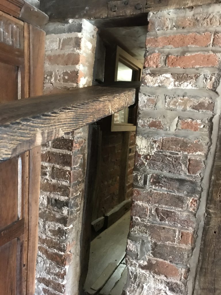 Opening to priest hide at Harvington Hall