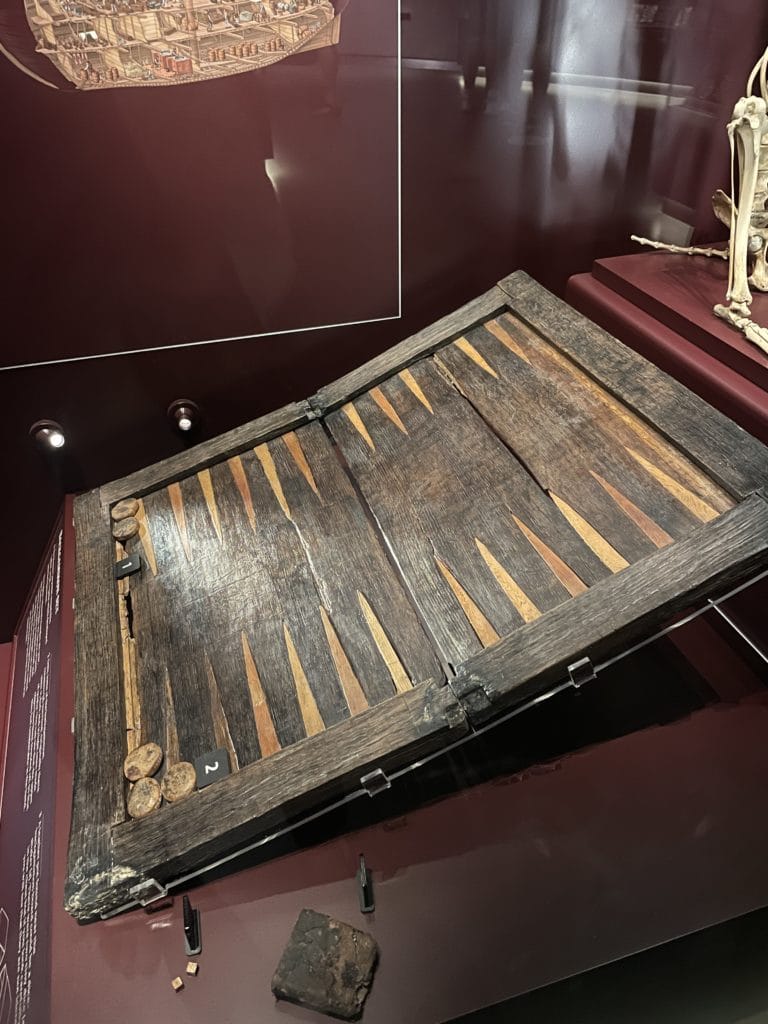 Wooden backgammon set with counters at the Mary Rose Museum
