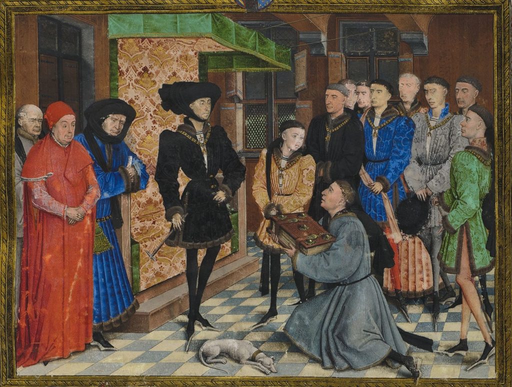 A picture of a medieval scenes of a kneeling man presenting a book to Philip the Good.