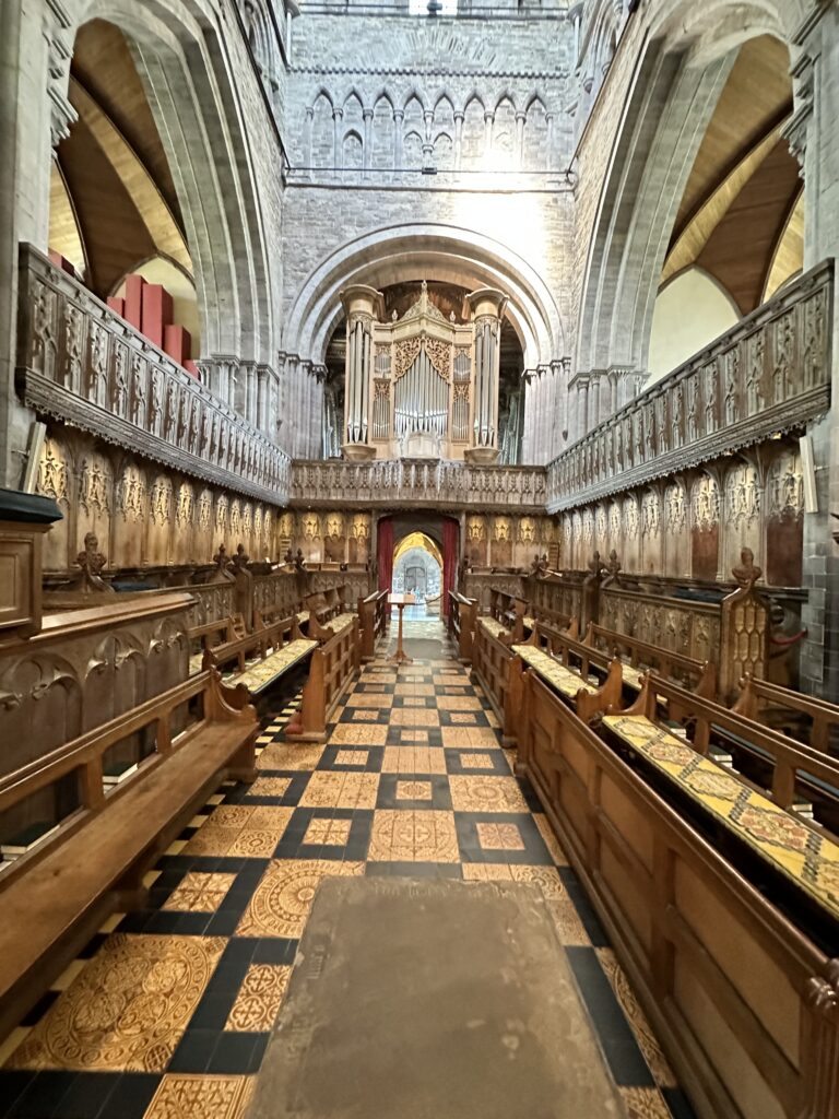 The cathedral choir. By the altar are rare surviving medieval floor tiles.