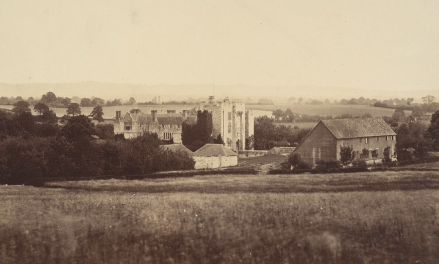 An old photo of Hever Castle, showing the now demolished barn and gatehouse
