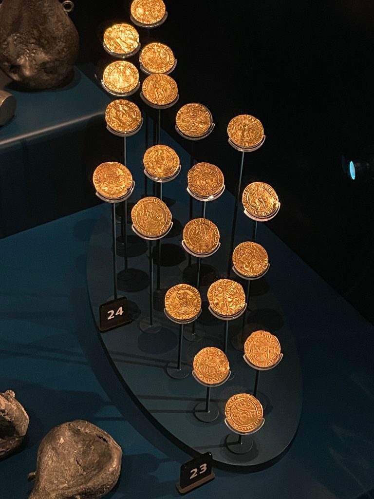 Purser's gold and silver coins, found in chest in a small store on the orlop deck  at the Mary Rose Museum