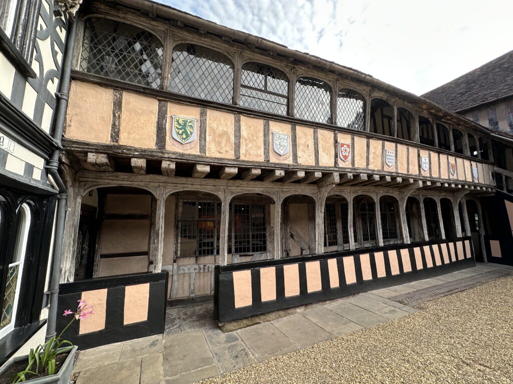External view of the Lord Leycester, Warwick. In 1571, Robert Dudley, Queen Elizabeth I's favoured courtier, founded a community of Masters and Brethren within the former Guild premises.
