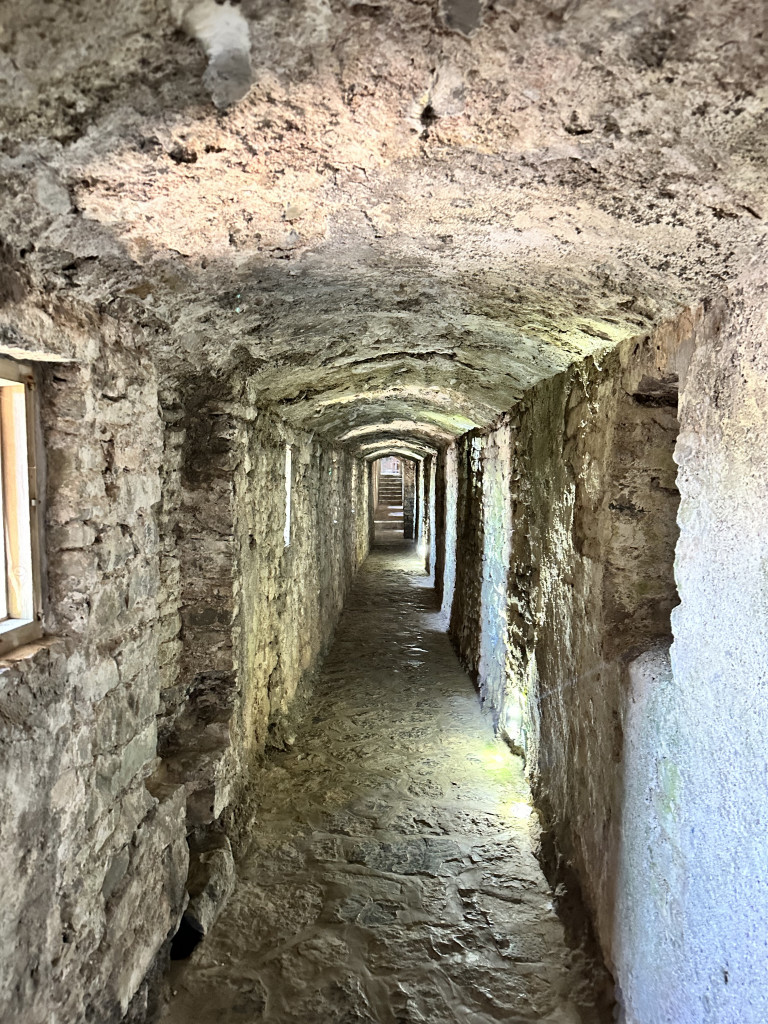 A walkway hewn into the castle walls at Pembroke Castle.