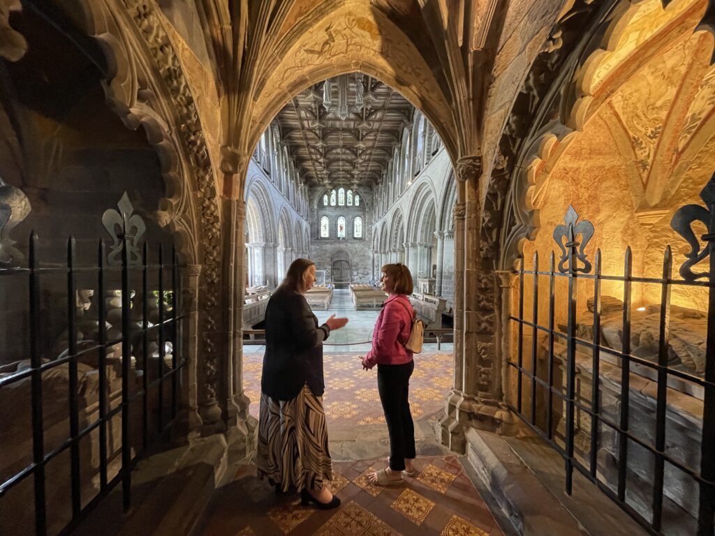 Sarah and Mari at the archway to the nave, St David's Cathedral.